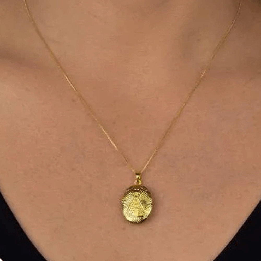 Relicário Nossa Senhora Aparecida banhado em ouro 18k - 1 foto